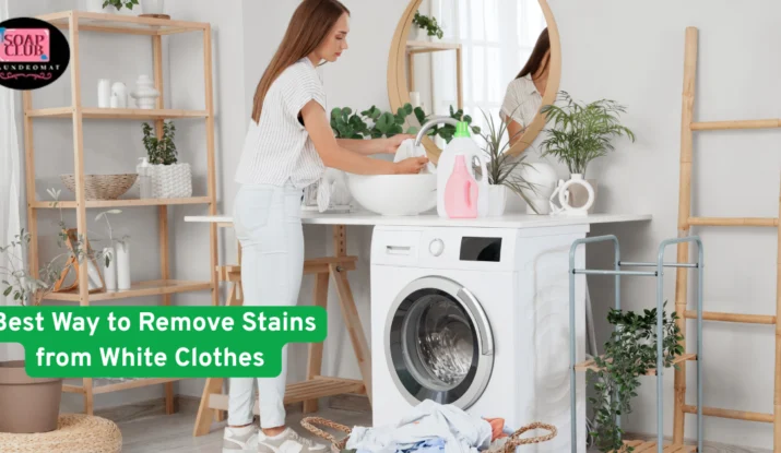 A woman doing laundry beside a modern white washing machine with detergent and white clothes, in a stylish home interior with plants and wooden decor.